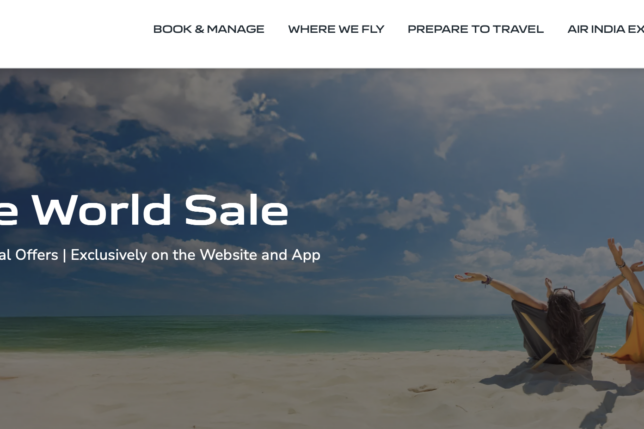 a woman sitting on a beach